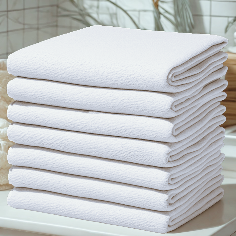 White towels in a bathroom 